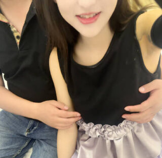 A stunningly beautiful young woman, her cousin, was being played with in a 3P encounter, moaning and whimpering as she was being fucked.