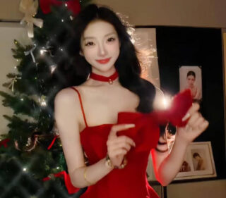 A woman in a hotel corridor stood naked as punishment, leaning against someone’s doorway, provocatively inviting people to come and go.